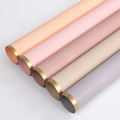 ซื้อ Matt Florist กระดาษห่อช่อดอกไม้ 50 ไมครอนพร้อมขอบสีทอง online manufacture