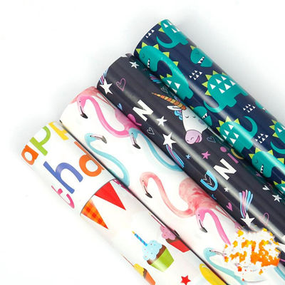 ซื้อ ฟลามิงโกและไดโนเสาร์กระดาษห่อของขวัญสีทองม้วนออกแบบการ์ตูนสำหรับเด็ก การผลิตออนไลน์