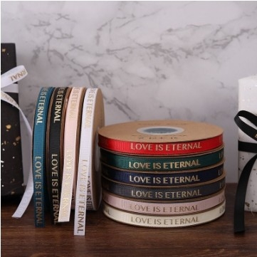 ราคาดี 1 ซม ความแข็งแรงสูง ร้อน Stamping สายลอก Ribbon ดอกไม้บรรจุ Ribbon ด้วยสีที่กําหนดเอง ออนไลน์